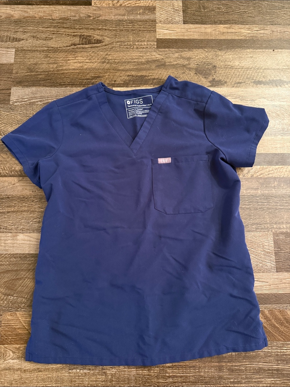 Figs Women’s Blue Short Sleeve V-Neck Scrub Top